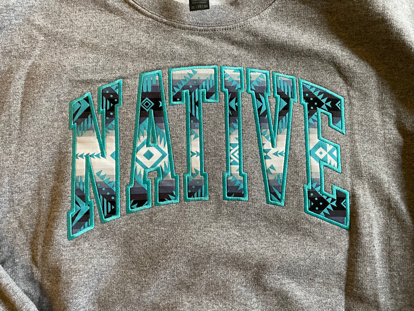 Gray and Teal Thunderbird